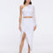 Monroe & Alani Fringe Asymmetric Knit White Set | Moeva | | Each week unveils new pieces—luxury swimwear, fluid resort silhouettes, and elevated summer-to-evening essentials designed to carry you from coastal escapes to city nights.