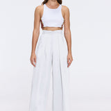 Manami White High Waist Wide Leg Pants | Moeva | Women RTW Pants | Each week unveils new pieces—luxury swimwear, fluid resort silhouettes, and elevated summer-to-evening essentials designed to carry you from coastal escapes to city nights.