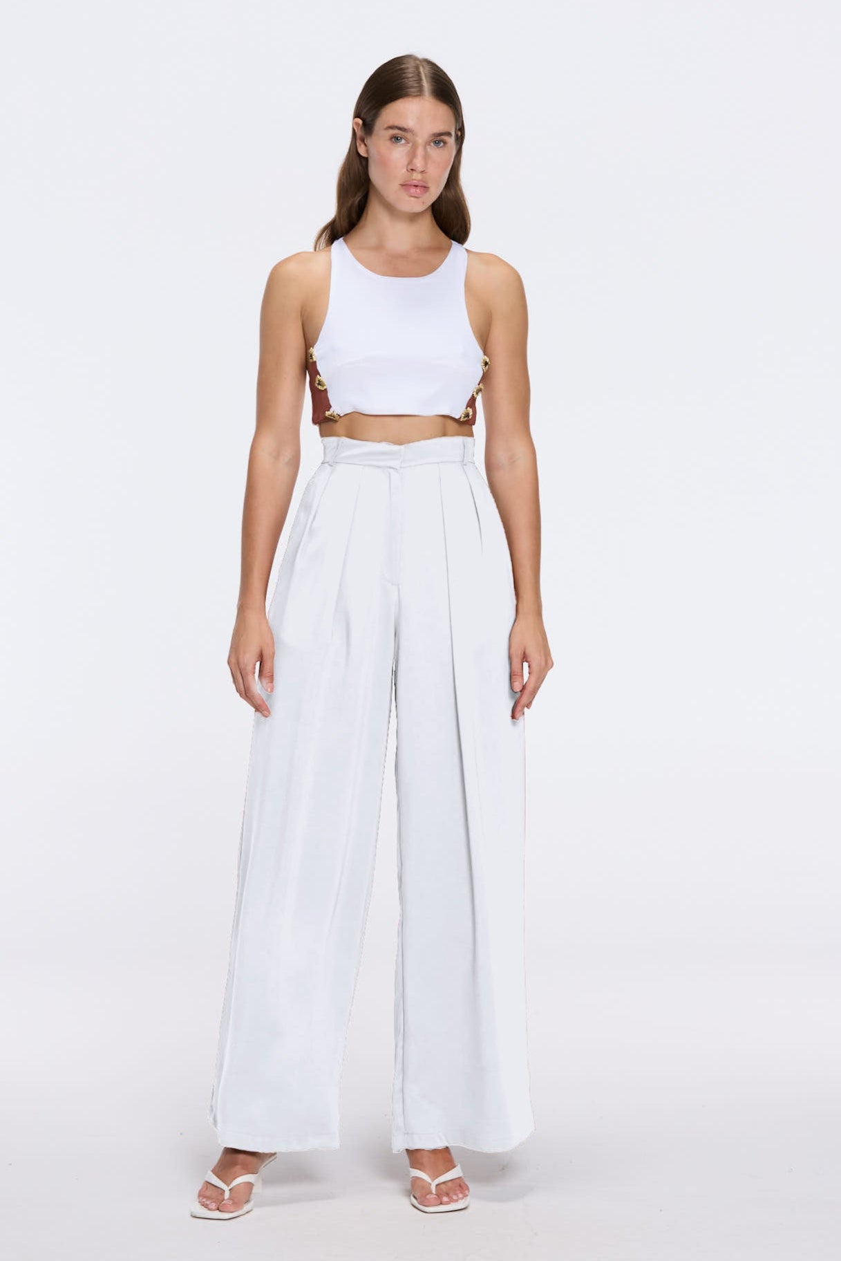Manami White High Waist Wide Leg Pants | Moeva | Women RTW Pants | Each week unveils new pieces—luxury swimwear, fluid resort silhouettes, and elevated summer-to-evening essentials designed to carry you from coastal escapes to city nights.