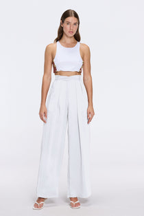 Manami White High Waist Wide Leg Pants | Moeva | Women RTW Pants | Each week unveils new pieces—luxury swimwear, fluid resort silhouettes, and elevated summer-to-evening essentials designed to carry you from coastal escapes to city nights.