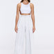 Manami White High Waist Wide Leg Pants | Moeva | Women RTW Pants | Each week unveils new pieces—luxury swimwear, fluid resort silhouettes, and elevated summer-to-evening essentials designed to carry you from coastal escapes to city nights.