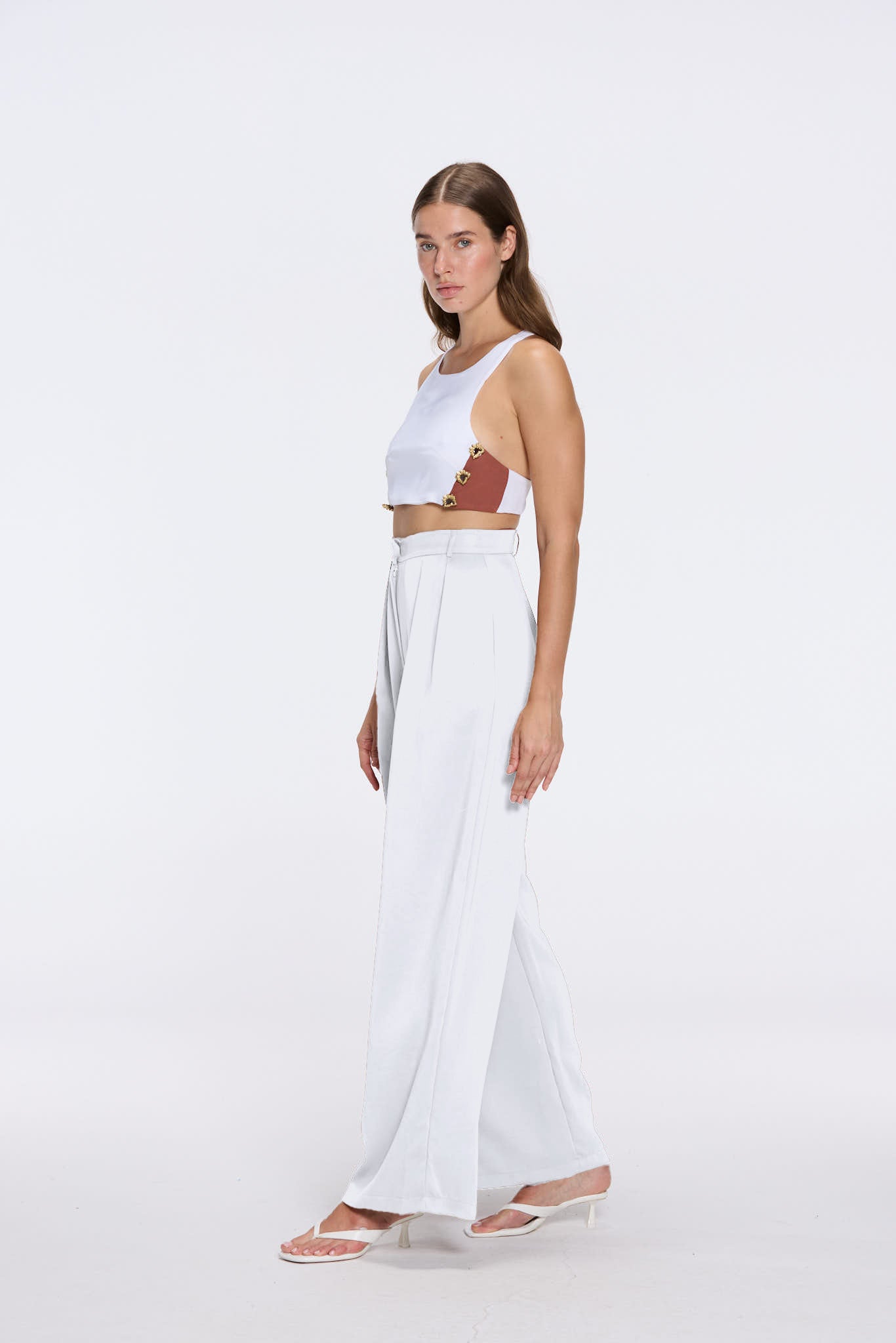 Manami White High Waist Wide Leg Pants | Moeva | Women RTW Pants | Each week unveils new pieces—luxury swimwear, fluid resort silhouettes, and elevated summer-to-evening essentials designed to carry you from coastal escapes to city nights.