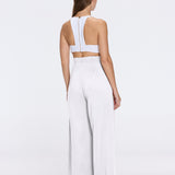 Manami White High Waist Wide Leg Pants | Moeva | Women RTW Pants | Each week unveils new pieces—luxury swimwear, fluid resort silhouettes, and elevated summer-to-evening essentials designed to carry you from coastal escapes to city nights.