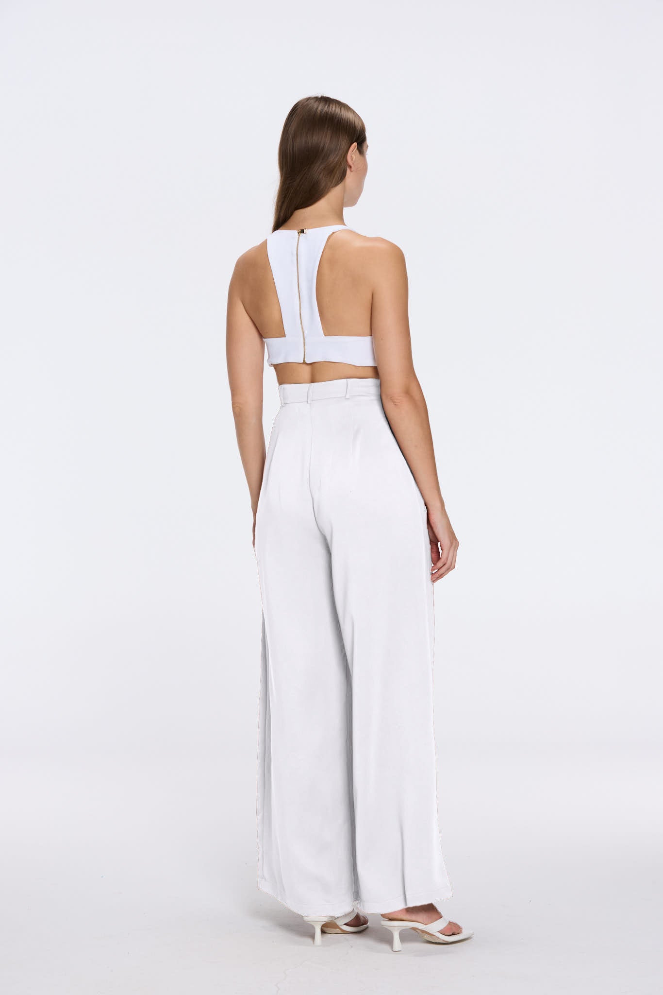 Manami White High Waist Wide Leg Pants | Moeva | Women RTW Pants | Each week unveils new pieces—luxury swimwear, fluid resort silhouettes, and elevated summer-to-evening essentials designed to carry you from coastal escapes to city nights.