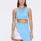 Riviera Blue-White Duo-Colored Asymmetric Gold Button Mini Skort | Moeva | RTW Skirts | Each week unveils new pieces—luxury swimwear, fluid resort silhouettes, and elevated summer-to-evening essentials designed to carry you from coastal escapes to city nights.