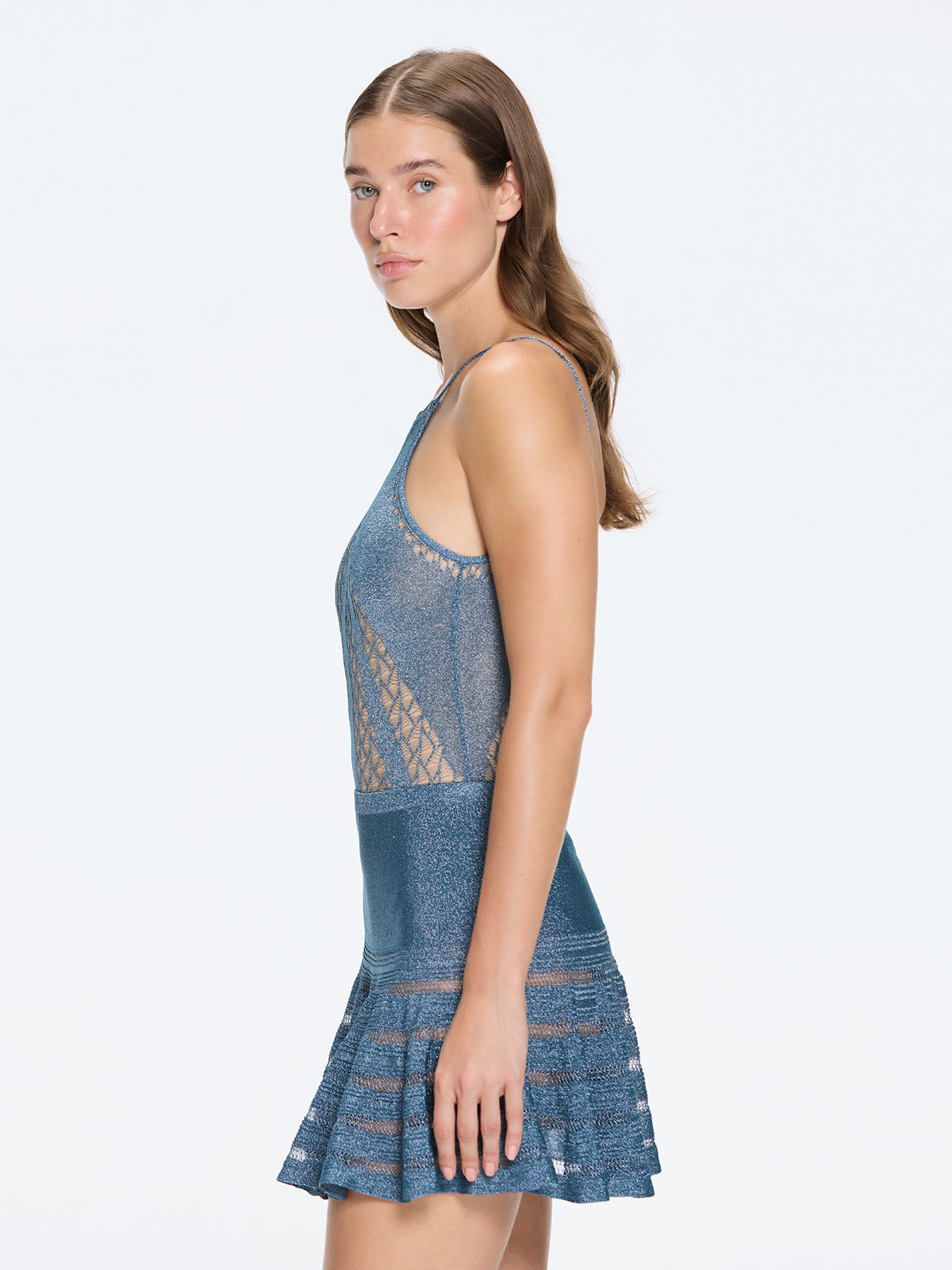 Eze Metallic Knit High-Waist Mini Blue Skirt | Moeva | Skirt | Each week unveils new pieces—luxury swimwear, fluid resort silhouettes, and elevated summer-to-evening essentials designed to carry you from coastal escapes to city nights.