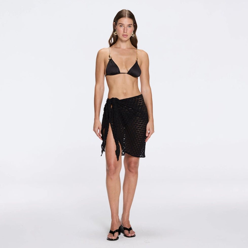 Dalina Mini Mesh Wrap Black Sarong | Moeva | Beachwear Skirts | Each week unveils new pieces—luxury swimwear, fluid resort silhouettes, and elevated summer-to-evening essentials designed to carry you from coastal escapes to city nights.