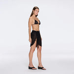 Dalina Mini Mesh Wrap Black Sarong | Moeva | Beachwear Skirts | Each week unveils new pieces—luxury swimwear, fluid resort silhouettes, and elevated summer-to-evening essentials designed to carry you from coastal escapes to city nights.