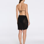 Dalina Mini Mesh Wrap Black Sarong | Moeva | Beachwear Skirts | Each week unveils new pieces—luxury swimwear, fluid resort silhouettes, and elevated summer-to-evening essentials designed to carry you from coastal escapes to city nights.