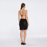 Dalina Mini Mesh Wrap Black Sarong | Moeva | Beachwear Skirts | Each week unveils new pieces—luxury swimwear, fluid resort silhouettes, and elevated summer-to-evening essentials designed to carry you from coastal escapes to city nights.