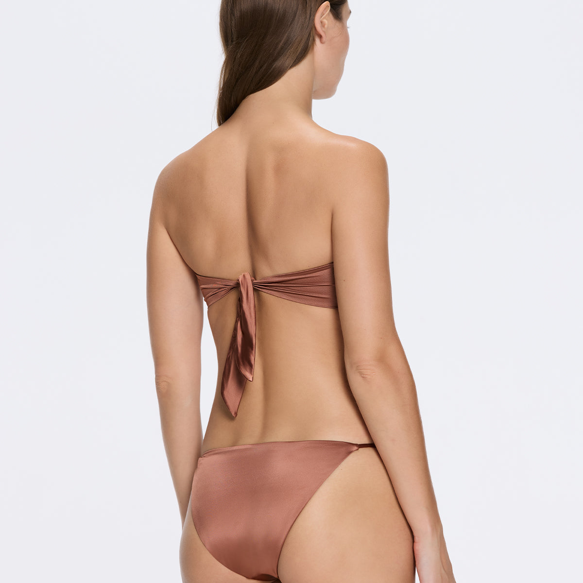 Astrid Bandeau Gold Detail Mid Coverage Satin Brown Bikini Set | Moeva | Bikini Set | Each week unveils new pieces—luxury swimwear, fluid resort silhouettes, and elevated summer-to-evening essentials designed to carry you from coastal escapes to city nights.