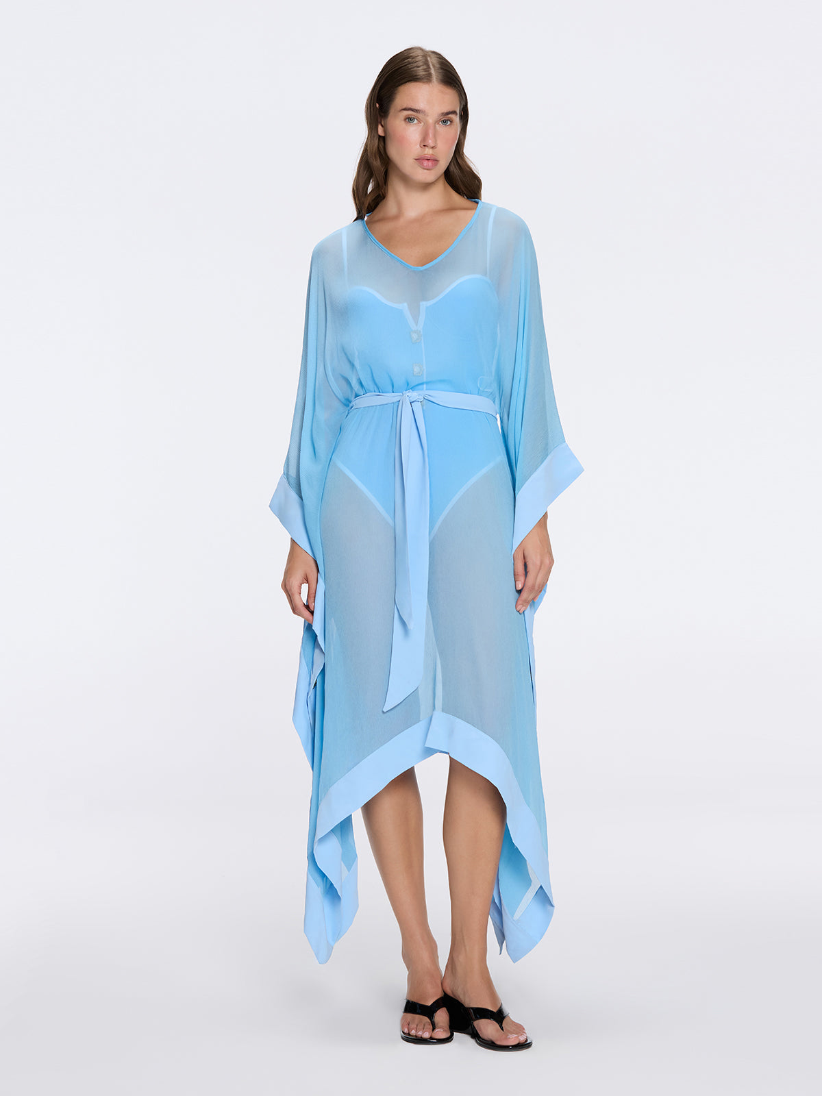 Tata Blue Sheer Gold Buttoned Belted Kaftan with Asymmetric Hem | Moeva | Kaftan | Each week unveils new pieces—luxury swimwear, fluid resort silhouettes, and elevated summer-to-evening essentials designed to carry you from coastal escapes to city nights.