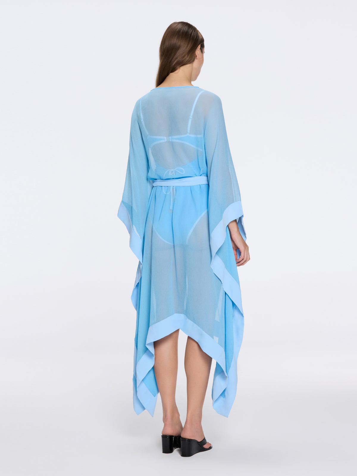 Tata Blue Sheer Gold Buttoned Belted Kaftan with Asymmetric Hem | Moeva | Kaftan | Each week unveils new pieces—luxury swimwear, fluid resort silhouettes, and elevated summer-to-evening essentials designed to carry you from coastal escapes to city nights.