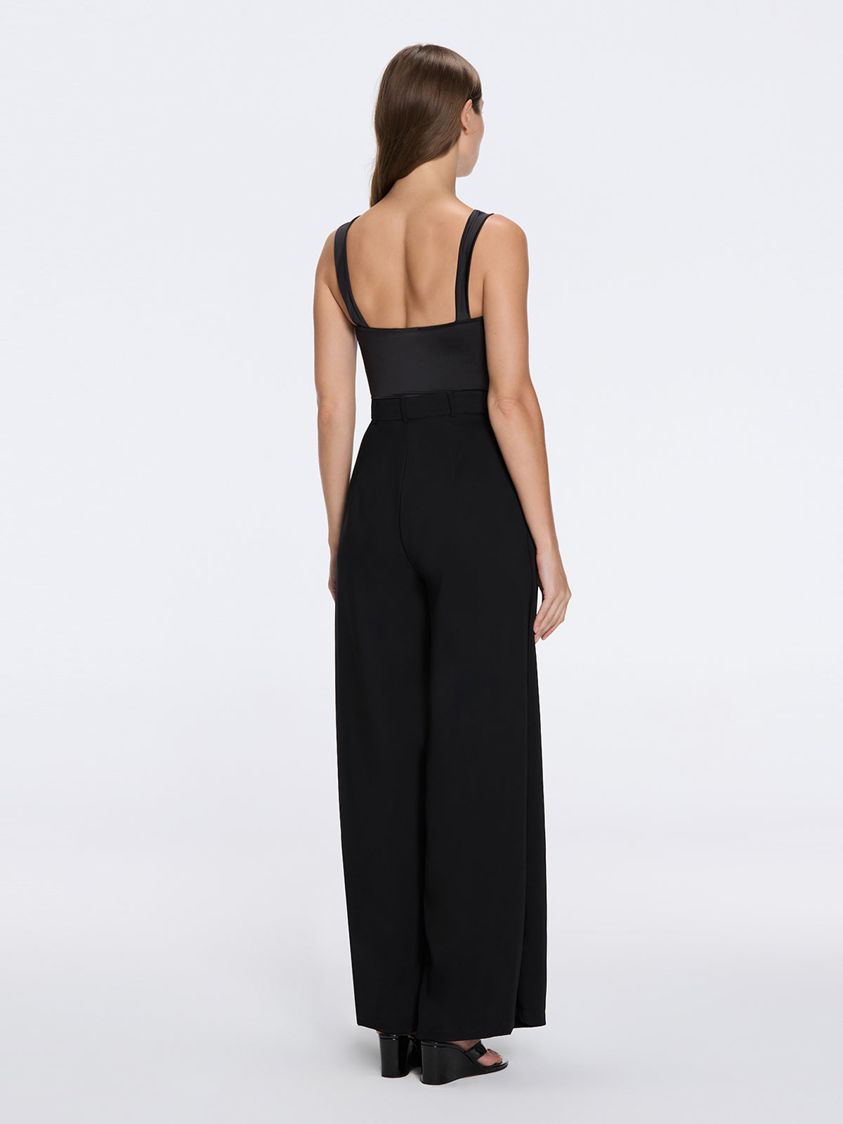 Manami Black High Waist Wide Leg Pants | Moeva | Women RTW Pants | Each week unveils new pieces—luxury swimwear, fluid resort silhouettes, and elevated summer-to-evening essentials designed to carry you from coastal escapes to city nights.