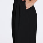 Manami Black High Waist Wide Leg Pants | Moeva | Women RTW Pants | Each week unveils new pieces—luxury swimwear, fluid resort silhouettes, and elevated summer-to-evening essentials designed to carry you from coastal escapes to city nights.