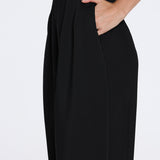 Manami Black High Waist Wide Leg Pants | Moeva | Women RTW Pants | Each week unveils new pieces—luxury swimwear, fluid resort silhouettes, and elevated summer-to-evening essentials designed to carry you from coastal escapes to city nights.
