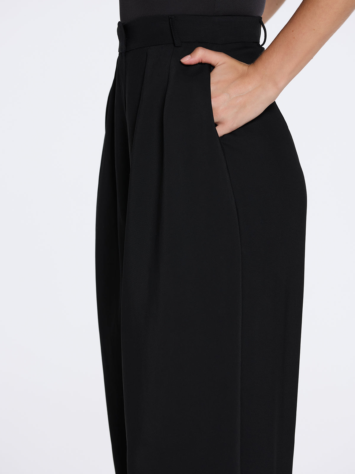 Manami Black High Waist Wide Leg Pants | Moeva | Women RTW Pants | Each week unveils new pieces—luxury swimwear, fluid resort silhouettes, and elevated summer-to-evening essentials designed to carry you from coastal escapes to city nights.