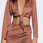 Greta Brown Satin Tie Front Shirt And Antonia Skirt Set | Moeva | Beachwear Tops | Each week unveils new pieces—luxury swimwear, fluid resort silhouettes, and elevated summer-to-evening essentials designed to carry you from coastal escapes to city nights.