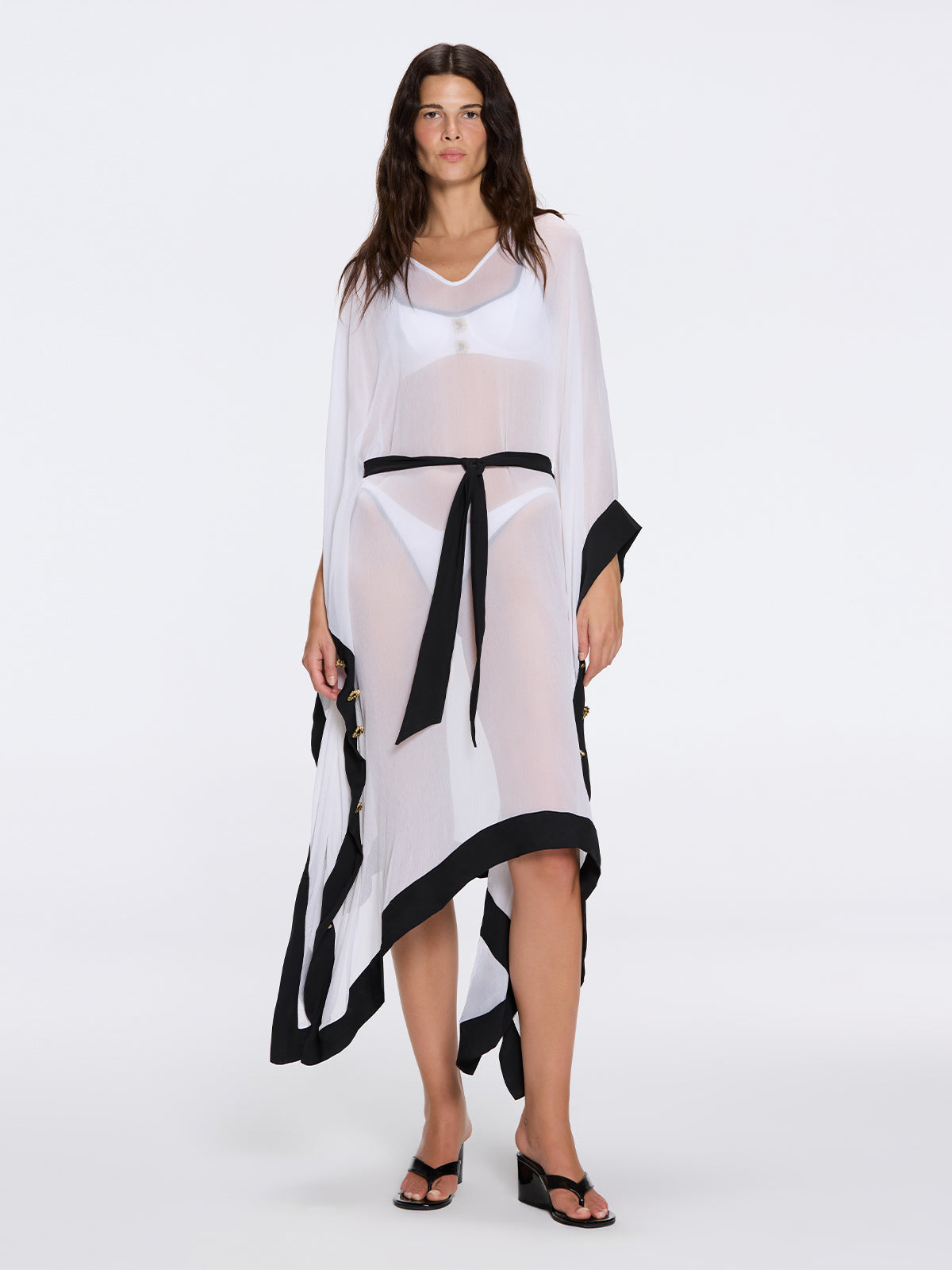 Tata White-Black Sheer Gold Buttoned Belted Kaftan with Asymmetric Hem | Moeva | Kaftan | Each week unveils new pieces—luxury swimwear, fluid resort silhouettes, and elevated summer-to-evening essentials designed to carry you from coastal escapes to city nights.