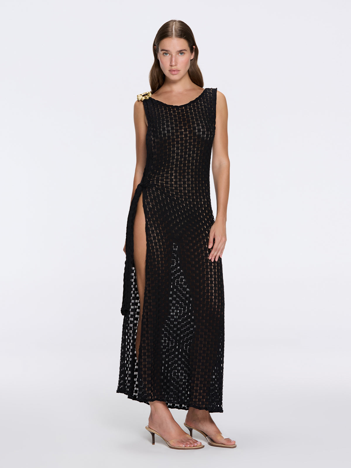 Angles Black High-Neck Maxi Dress with Tie-Side and Gold Detail | Moeva | Beachwear Dresses | Each week unveils new pieces—luxury swimwear, fluid resort silhouettes, and elevated summer-to-evening essentials designed to carry you from coastal escapes to city nights.
