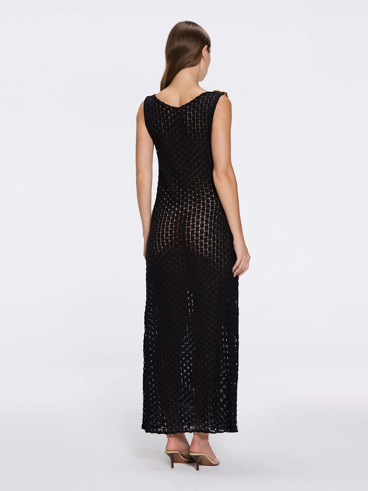 Angles Black High-Neck Maxi Dress with Tie-Side and Gold Detail | Moeva | Beachwear Dresses | Each week unveils new pieces—luxury swimwear, fluid resort silhouettes, and elevated summer-to-evening essentials designed to carry you from coastal escapes to city nights.