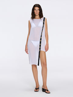 Solianne White Sheer Sleeveless Asymmetric Dress with Gold Button Detail | Moeva | Beachwear Dresses | Each week unveils new pieces—luxury swimwear, fluid resort silhouettes, and elevated summer-to-evening essentials designed to carry you from coastal escapes to city nights.