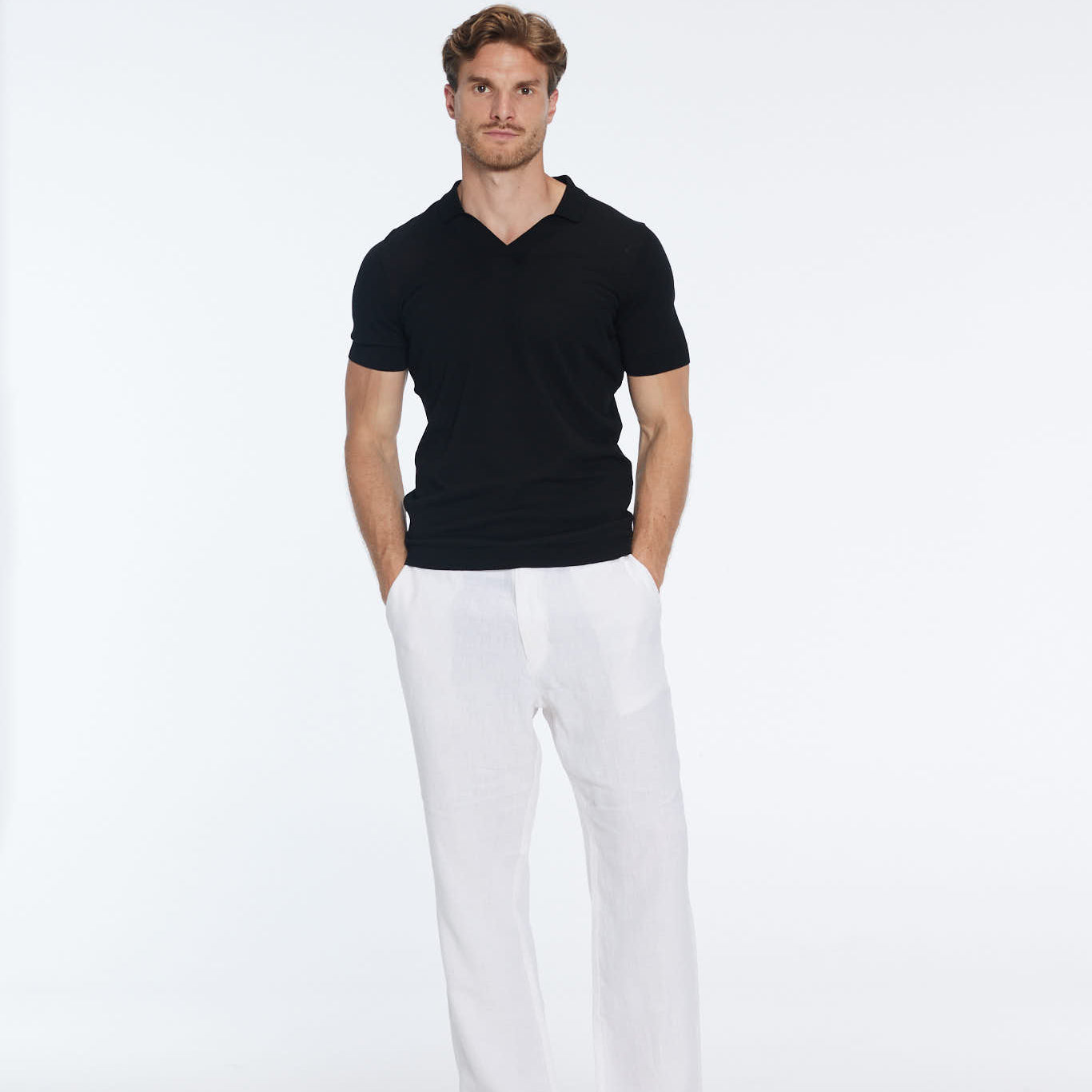Mark Black Cotton V-Neck Polo T-Shirt | Moeva | T-Shirt | Each week unveils new pieces—luxury swimwear, fluid resort silhouettes, and elevated summer-to-evening essentials designed to carry you from coastal escapes to city nights.