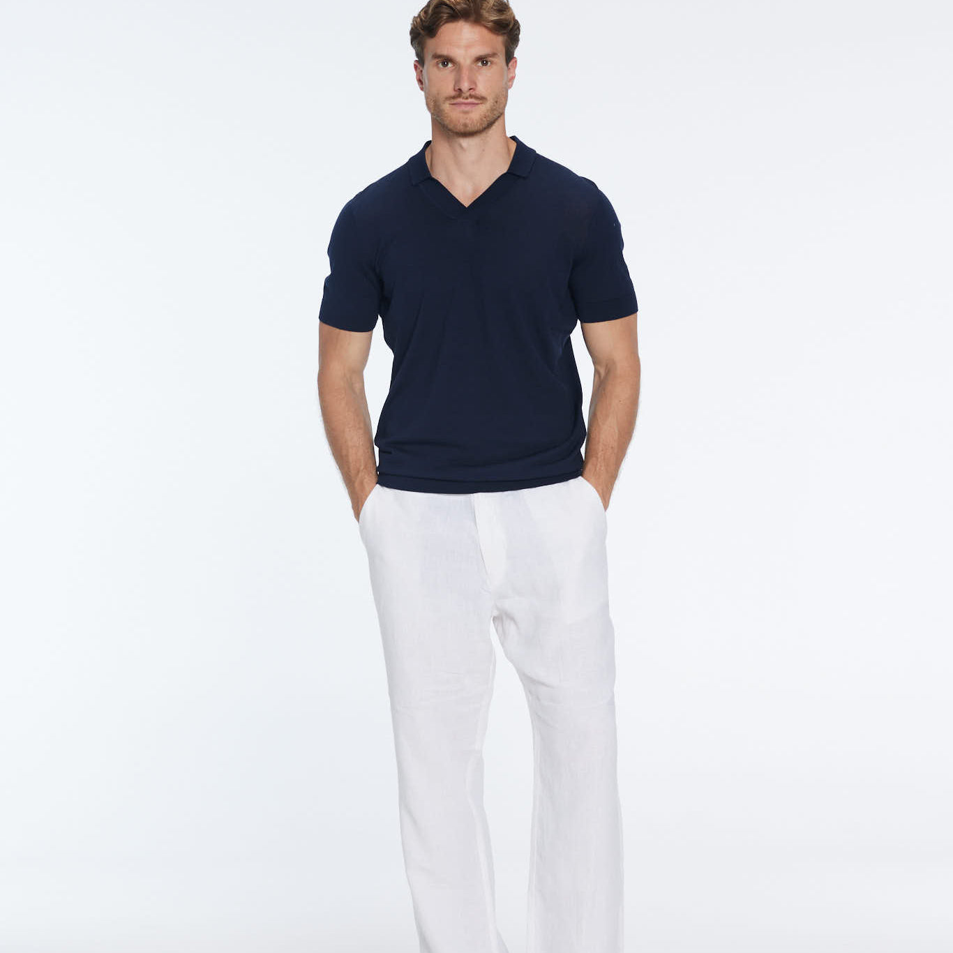 Mark Dark Blue Cotton V-Neck Polo T-Shirt | Moeva | T-Shirt | Each week unveils new pieces—luxury swimwear, fluid resort silhouettes, and elevated summer-to-evening essentials designed to carry you from coastal escapes to city nights.