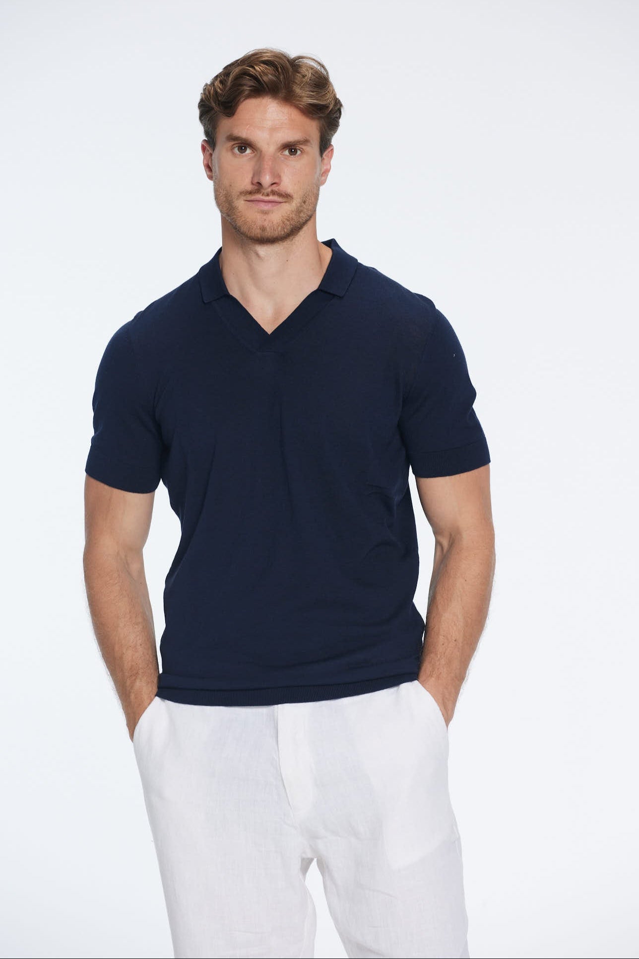 Mark Dark Blue Cotton V-Neck Polo T-Shirt | Moeva | | Each week unveils new pieces—luxury swimwear, fluid resort silhouettes, and elevated summer-to-evening essentials designed to carry you from coastal escapes to city nights.