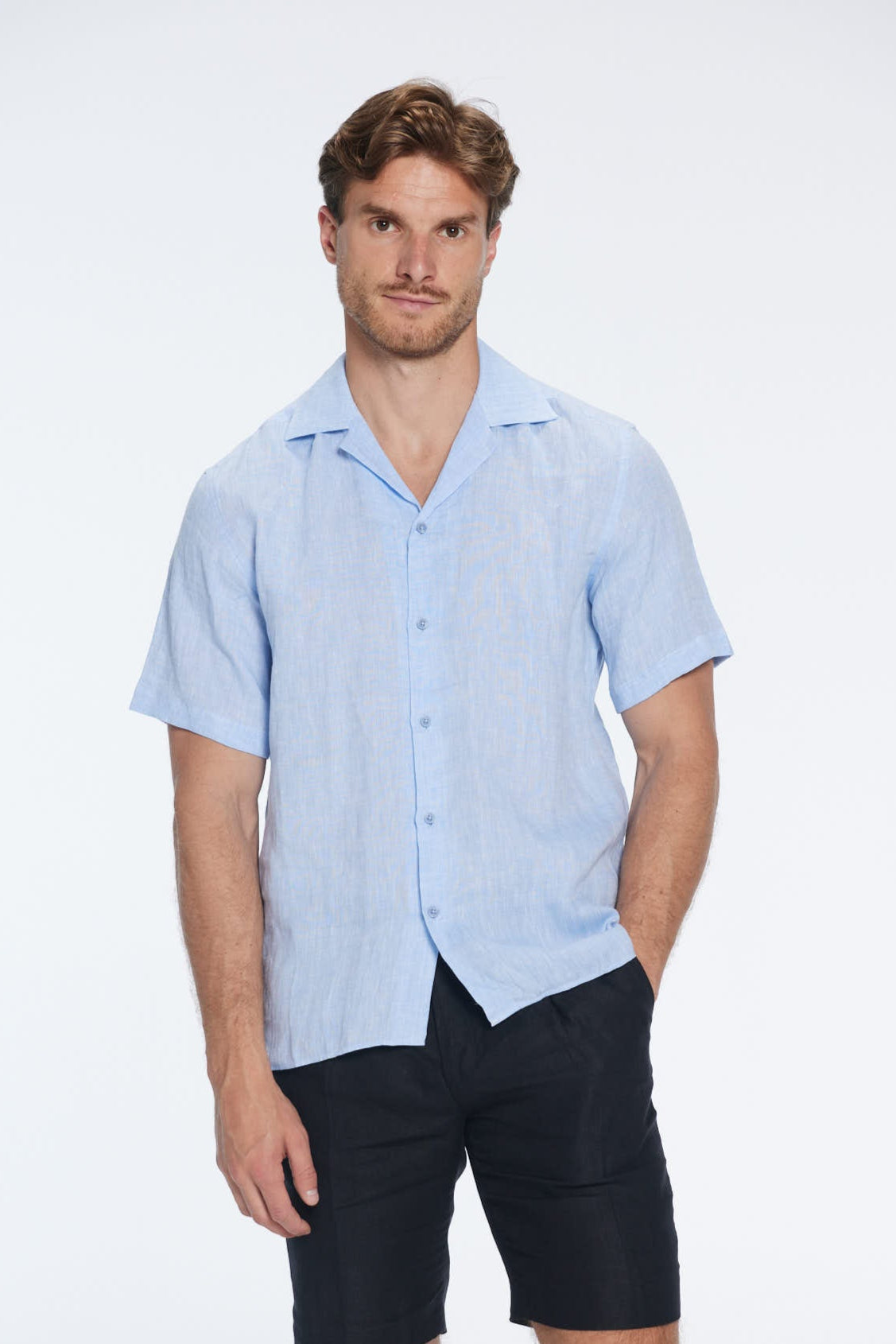 Romeo Baby Blue Linen Shirt with Camp Collar | Moeva | Men Classic Collar Shirts | Each week unveils new pieces—luxury swimwear, fluid resort silhouettes, and elevated summer-to-evening essentials designed to carry you from coastal escapes to city nights.