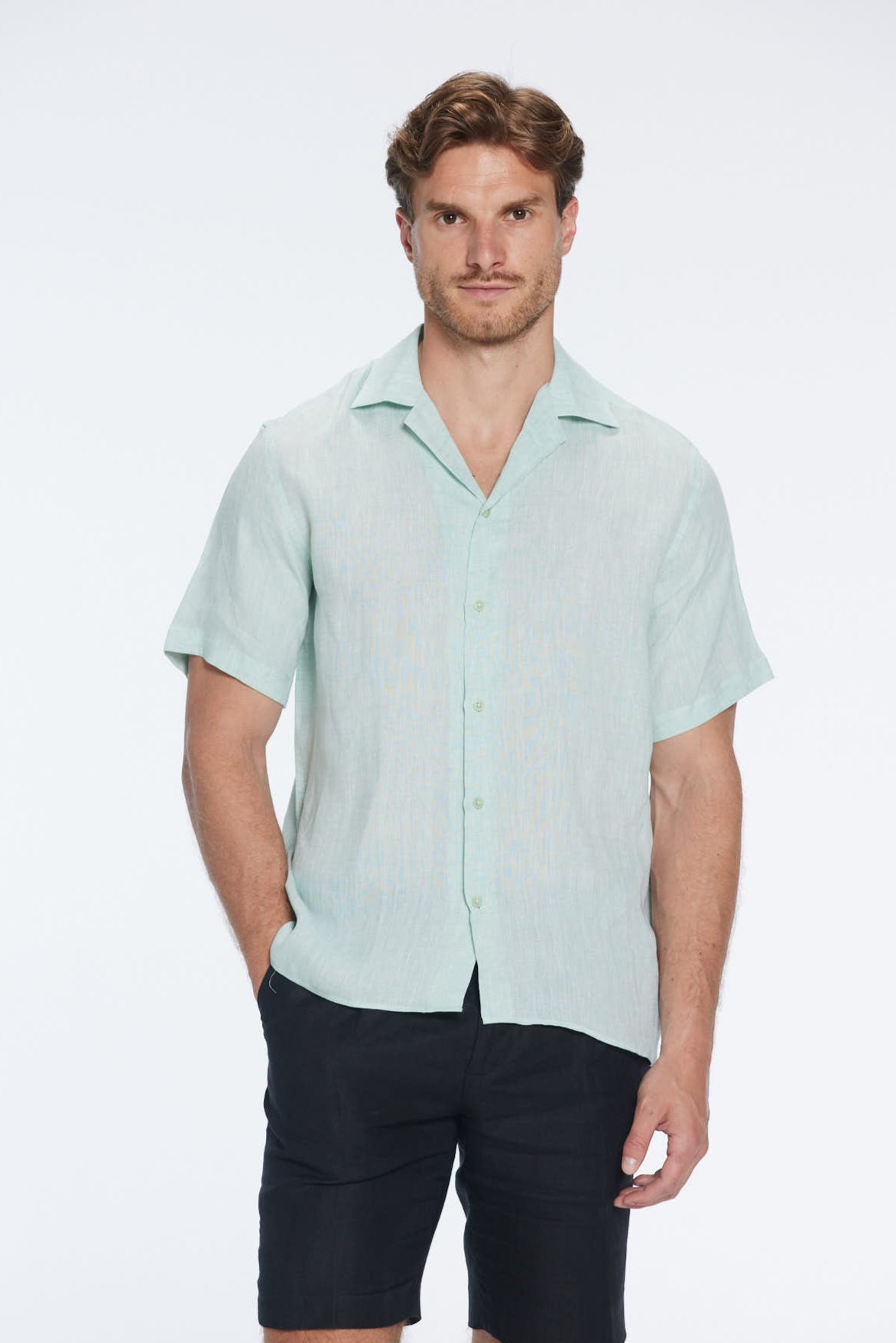 Romeo Green Linen Shirt with Camp Collar | Moeva | Men Classic Collar Shirts | Each week unveils new pieces—luxury swimwear, fluid resort silhouettes, and elevated summer-to-evening essentials designed to carry you from coastal escapes to city nights.