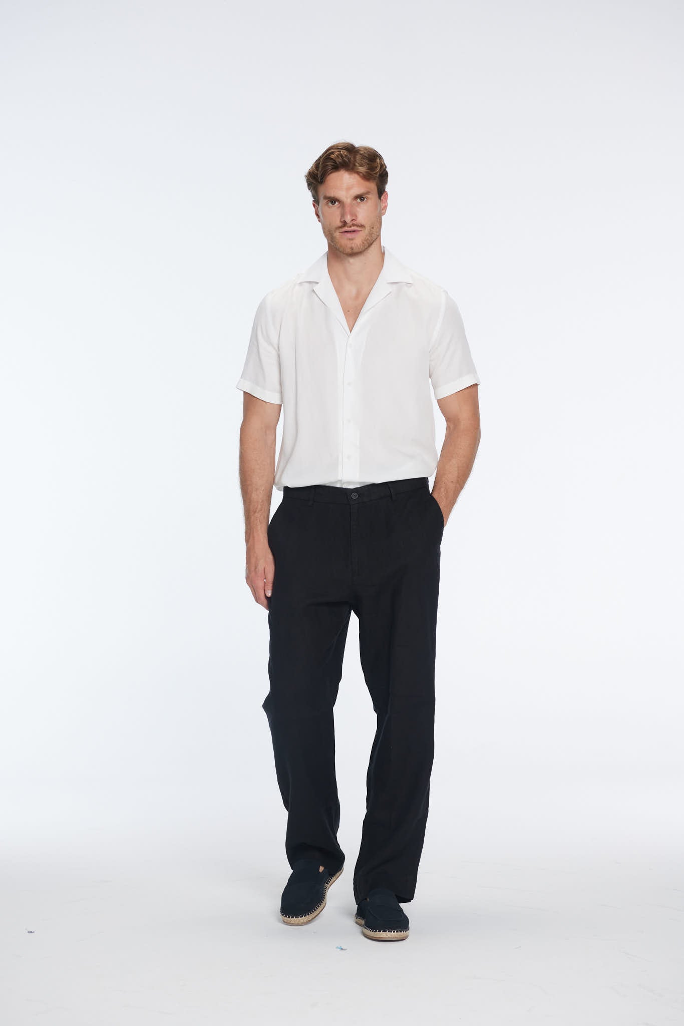 Adrian Black Linen Straight-Leg Pants | Moeva | | Each week unveils new pieces—luxury swimwear, fluid resort silhouettes, and elevated summer-to-evening essentials designed to carry you from coastal escapes to city nights.