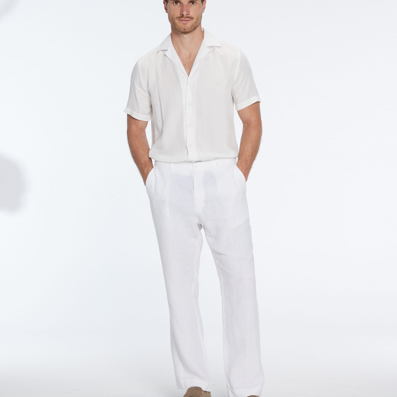 Adrian White Linen Straight-Leg Pants | Moeva | Pants | Each week unveils new pieces—luxury swimwear, fluid resort silhouettes, and elevated summer-to-evening essentials designed to carry you from coastal escapes to city nights.