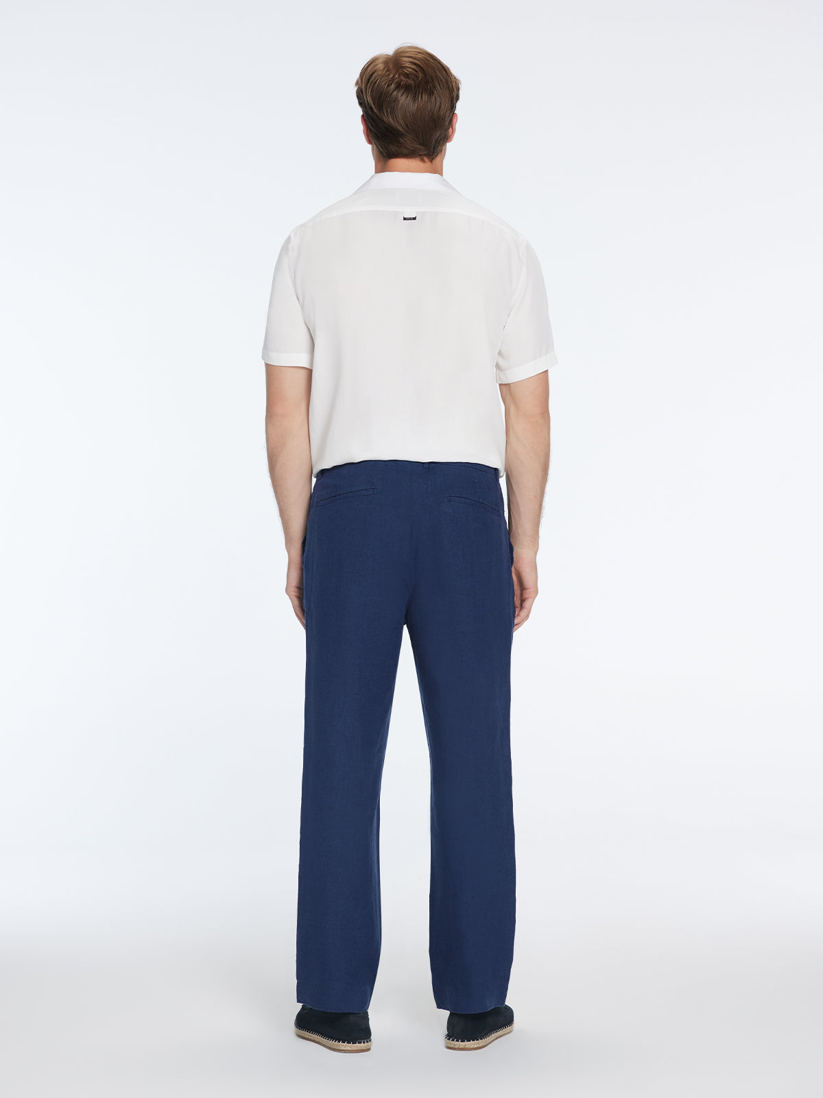 Adrian Dark Blue Linen Straight-Leg Pants | Moeva | Pants | Each week unveils new pieces—luxury swimwear, fluid resort silhouettes, and elevated summer-to-evening essentials designed to carry you from coastal escapes to city nights.