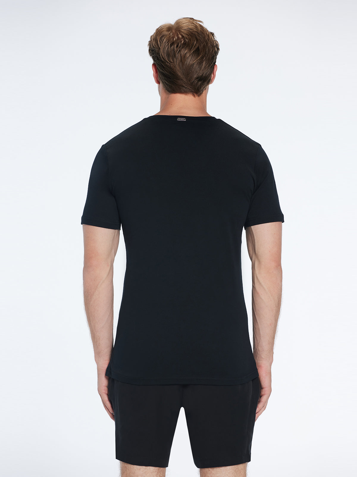 Rex Black V-Neck Cotton T-Shirt | Moeva | T-Shirt | Each week unveils new pieces—luxury swimwear, fluid resort silhouettes, and elevated summer-to-evening essentials designed to carry you from coastal escapes to city nights.