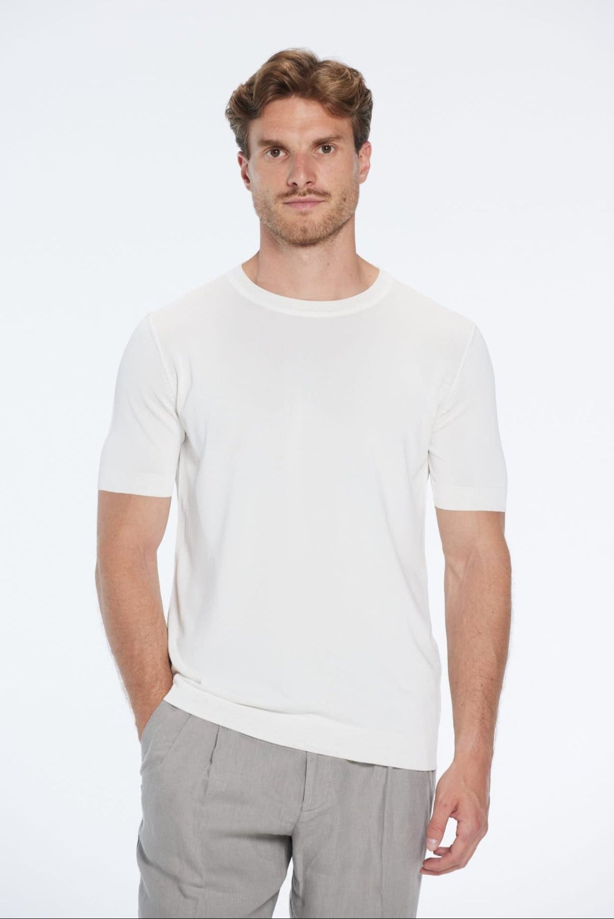 Oscar White Round Neck T-Shirt | Moeva | Men Round Neck Shirts | Each week unveils new pieces—luxury swimwear, fluid resort silhouettes, and elevated summer-to-evening essentials designed to carry you from coastal escapes to city nights.