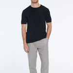 Atlas Black Cotton Round Neck T-Shirt | Moeva | Men Round Neck Shirts | Each week unveils new pieces—luxury swimwear, fluid resort silhouettes, and elevated summer-to-evening essentials designed to carry you from coastal escapes to city nights.