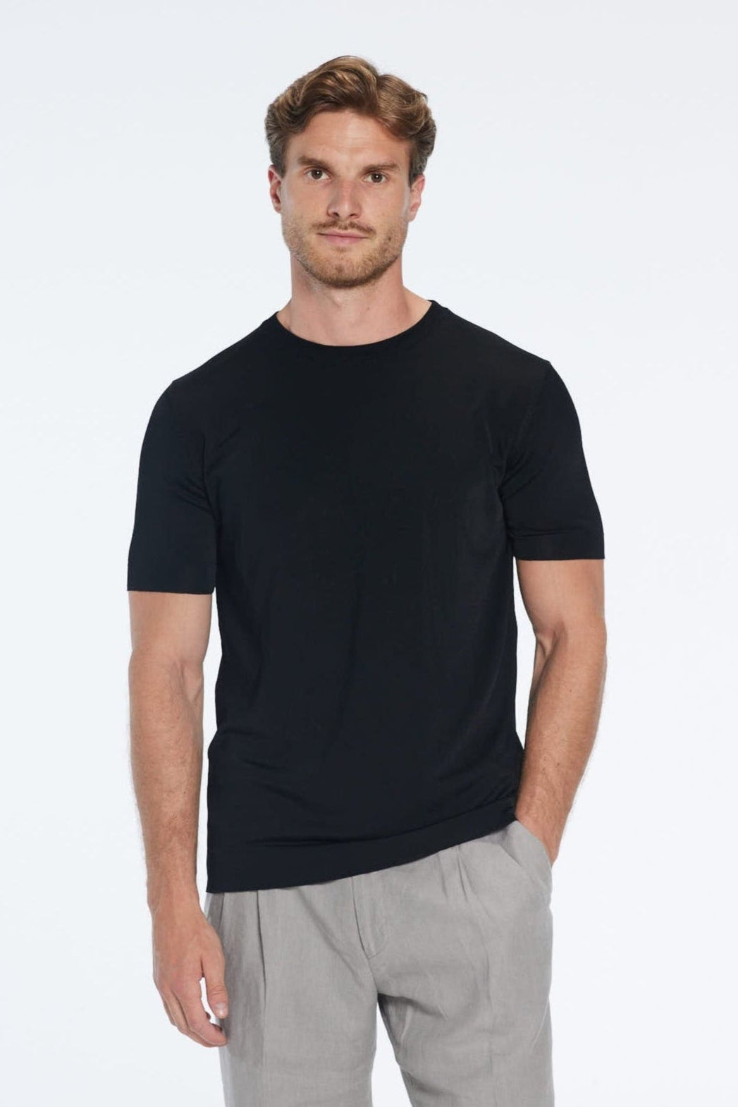 Oscar Black Round Neck T-Shirt | Moeva | T-Shirt | Each week unveils new pieces—luxury swimwear, fluid resort silhouettes, and elevated summer-to-evening essentials designed to carry you from coastal escapes to city nights.