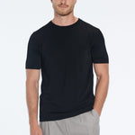 Oscar Black Round Neck T-Shirt | Moeva | Men Round Neck Shirts | Each week unveils new pieces—luxury swimwear, fluid resort silhouettes, and elevated summer-to-evening essentials designed to carry you from coastal escapes to city nights.