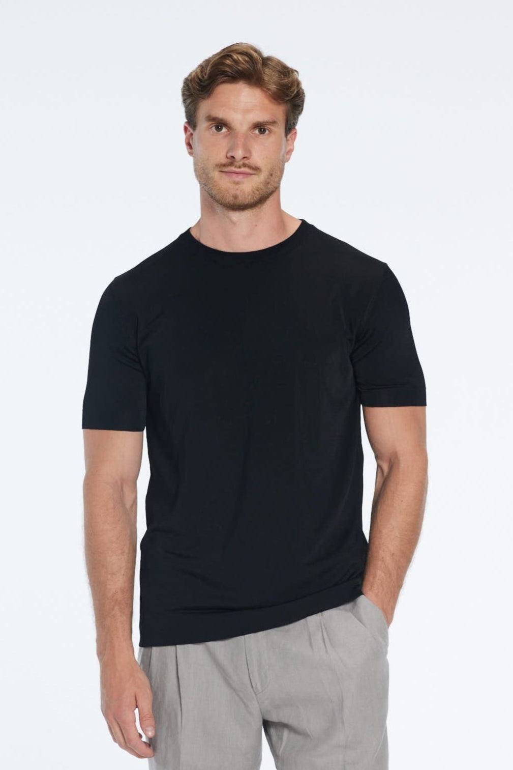 Oscar Black Round Neck T-Shirt | Moeva | T-Shirt | Each week unveils new pieces—luxury swimwear, fluid resort silhouettes, and elevated summer-to-evening essentials designed to carry you from coastal escapes to city nights.