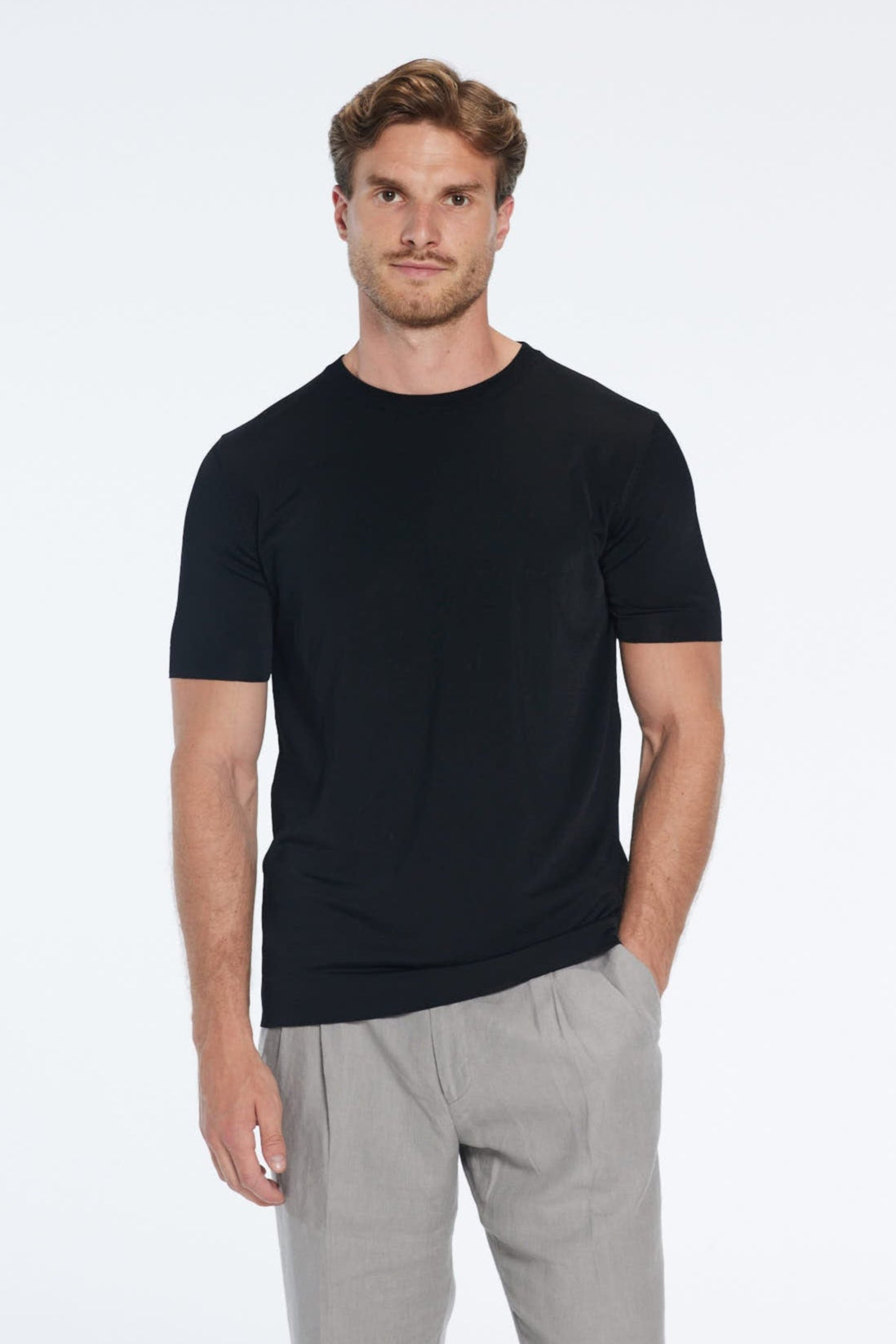 Oscar Black Round Neck T-Shirt | Moeva | Men Round Neck Shirts | Each week unveils new pieces—luxury swimwear, fluid resort silhouettes, and elevated summer-to-evening essentials designed to carry you from coastal escapes to city nights.