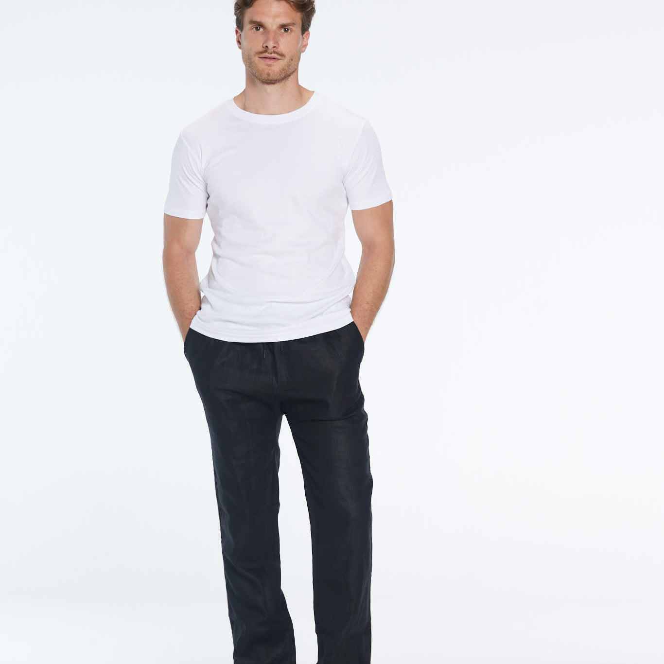 Joseph Black Linen Straight-Leg Pants | Moeva | Pants | Each week unveils new pieces—luxury swimwear, fluid resort silhouettes, and elevated summer-to-evening essentials designed to carry you from coastal escapes to city nights.