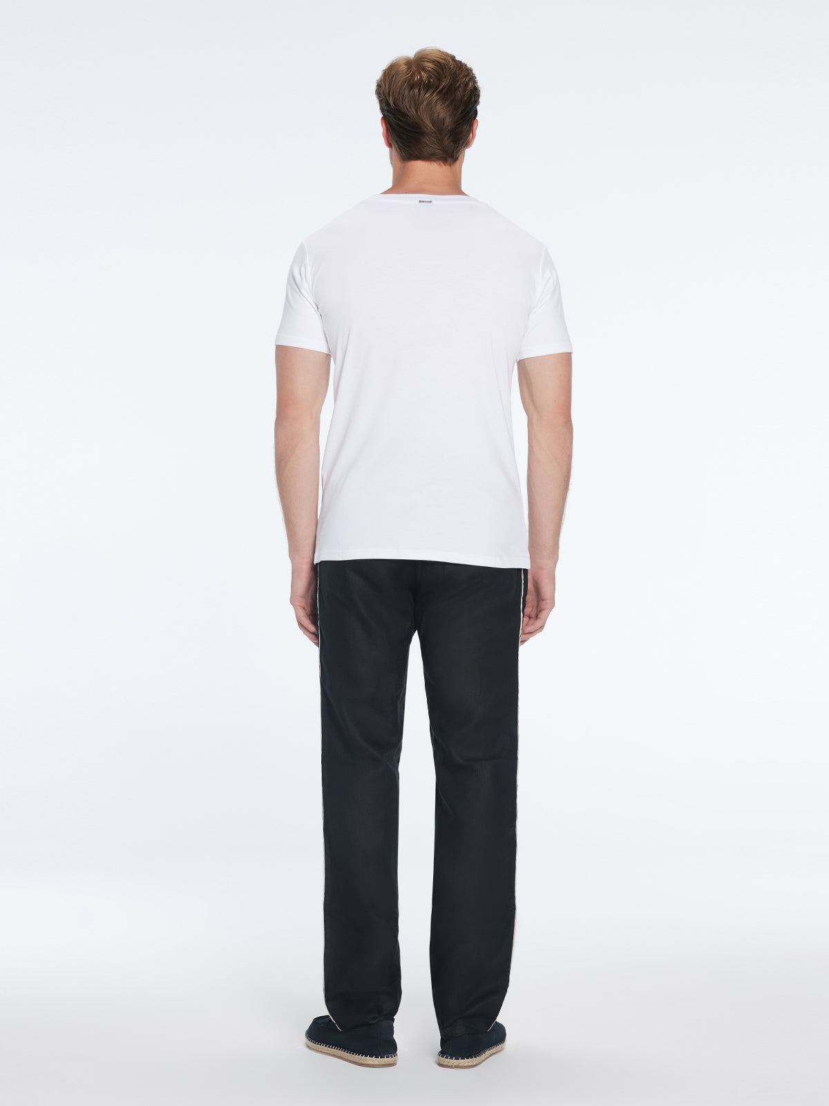 Joseph Black Linen Straight-Leg Pants | Moeva | Pants | Each week unveils new pieces—luxury swimwear, fluid resort silhouettes, and elevated summer-to-evening essentials designed to carry you from coastal escapes to city nights.