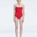 "Model wearing the Marigold Red Swimsuit from the Synersphere SS25 collection, with a square neckline and boned torso."
