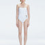 "Model wearing the Marigold White Swimsuit from the Synersphere SS25 collection, with a square neckline and boned torso."
