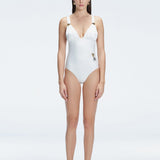 Front view of model wearing Marina Degraded White One Piece swimsuit with halter neck and ruched waist detail.
