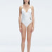 Front view of model wearing Marina Degraded White One Piece swimsuit with halter neck and ruched waist detail.
