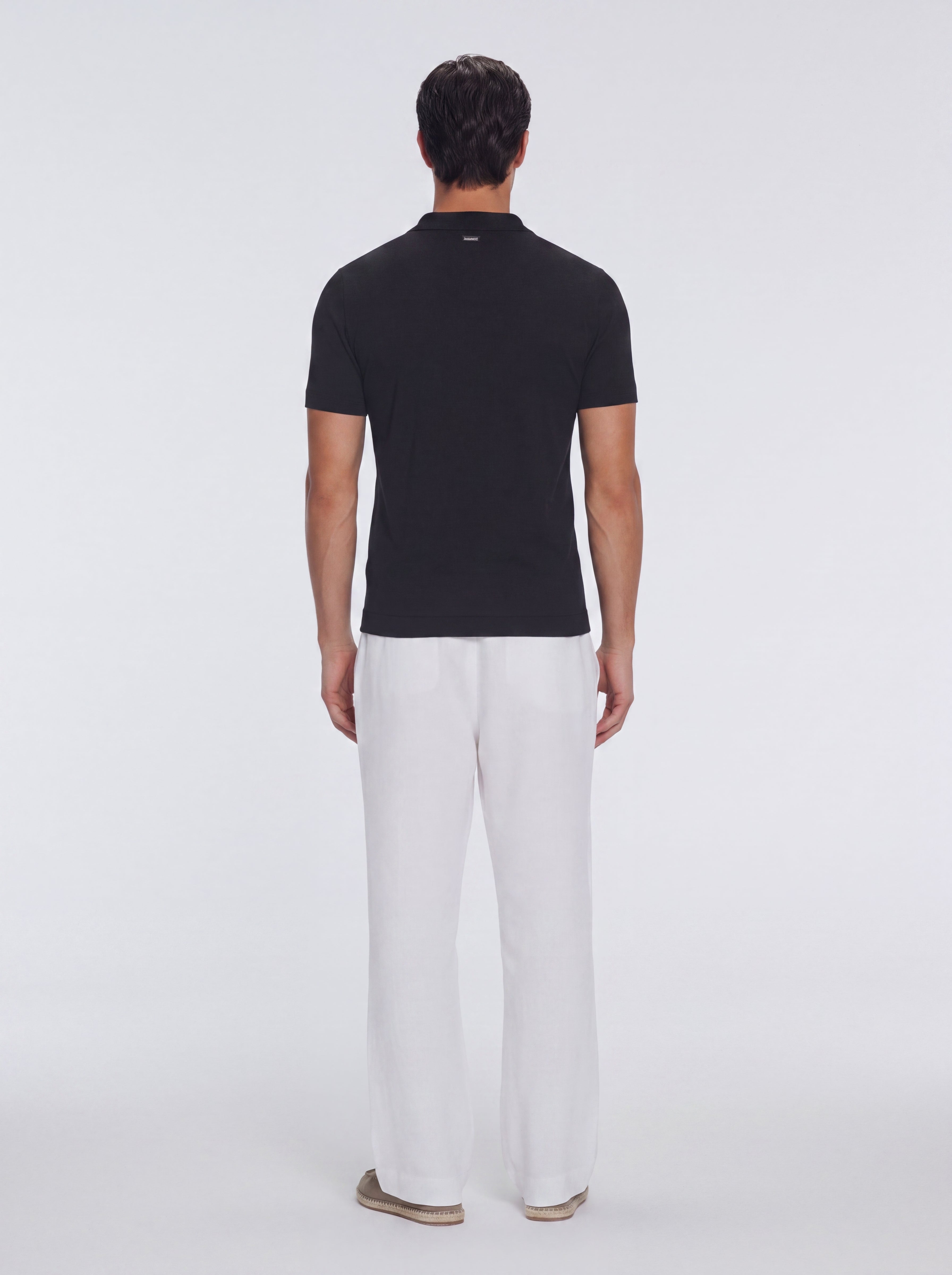 Mark Black Cotton V-Neck Polo T-Shirt | Moeva | T-Shirt | Each week unveils new pieces—luxury swimwear, fluid resort silhouettes, and elevated summer-to-evening essentials designed to carry you from coastal escapes to city nights.