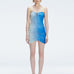 Model showcasing the Marsiela Blue Sonar Dress, highlighting the strapless design and flattering ruched detail.