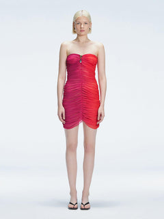 Model showcasing the Marsiela Red  Sonar Dress, highlighting the strapless design and flattering ruched detail.